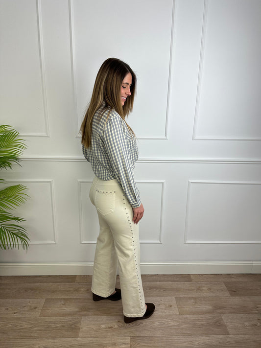 Vaquero beige con tachuelas